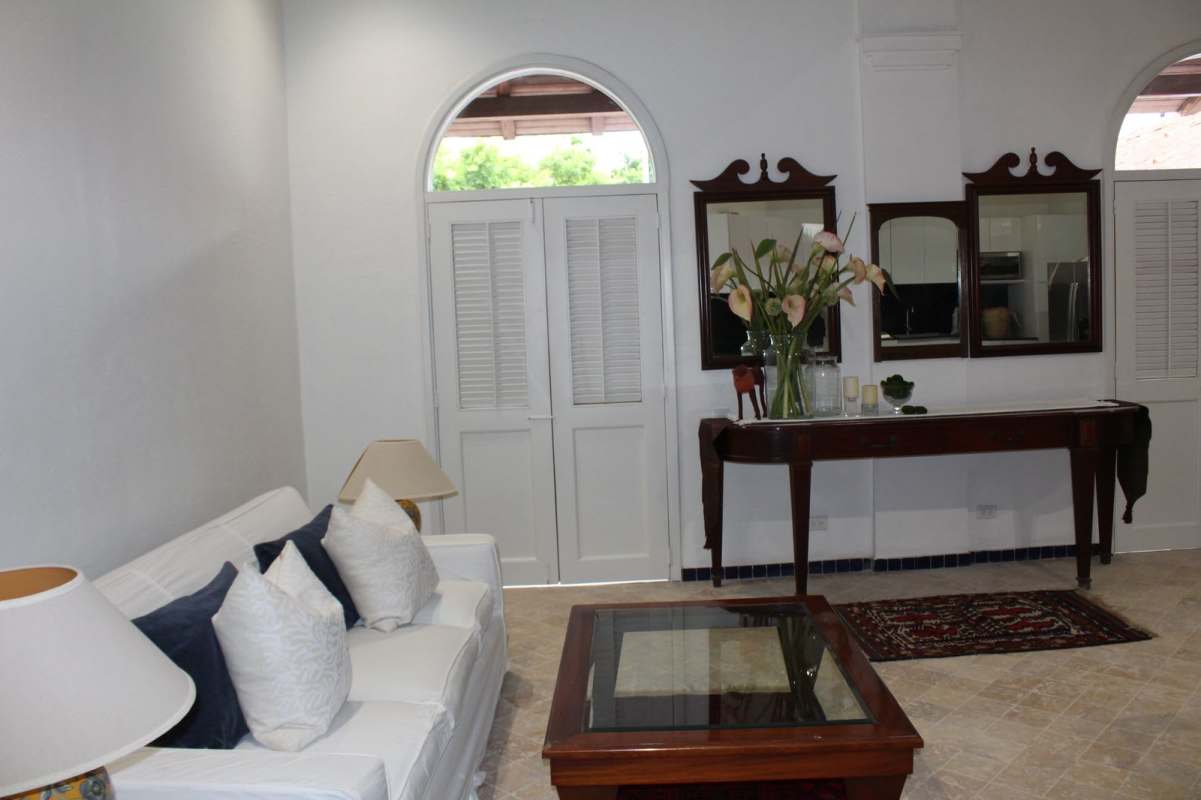 Mediterranean interior living room with arches and balcony Casco Viejo PH Hotel Colombia