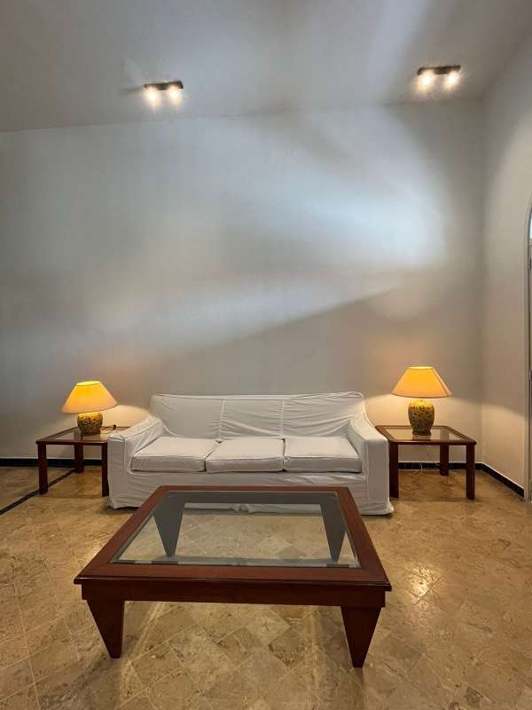 Bright bedroom with balcony, colonial tile floor, arched windows and AC in PH Hotel Colombia Casco Viejo Panama