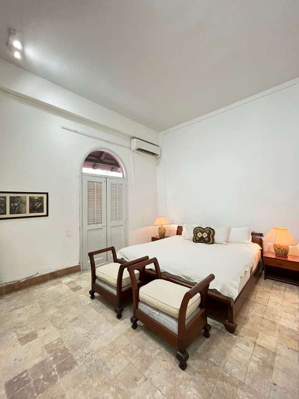 Panoramic exterior view of Casco Viejo colonial buildings and church bell tower from PH Hotel Colombia