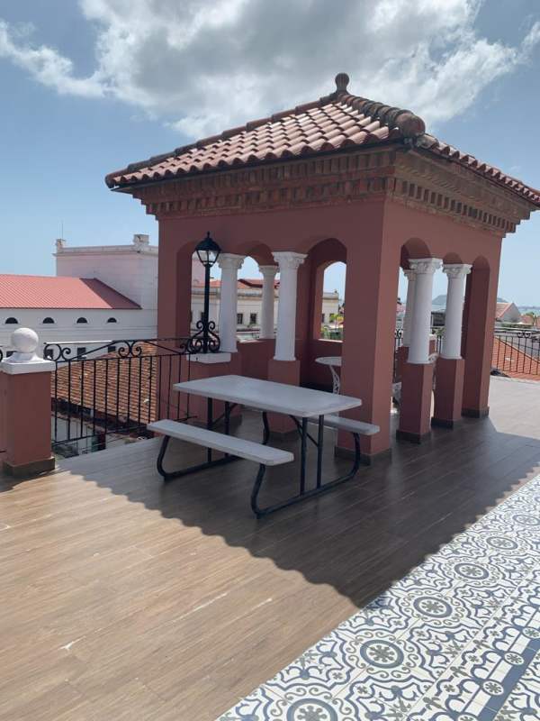 Rooftop terrace with gazebo, ocean and city views at PH Hotel Colombia Casco Viejo Panama