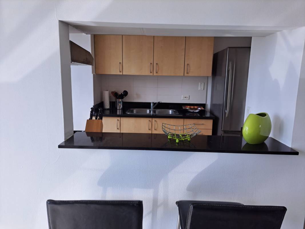 Master bedroom with large window ocean view, built-in closet, ensuite bathroom in PH Costa del Este Park Panama