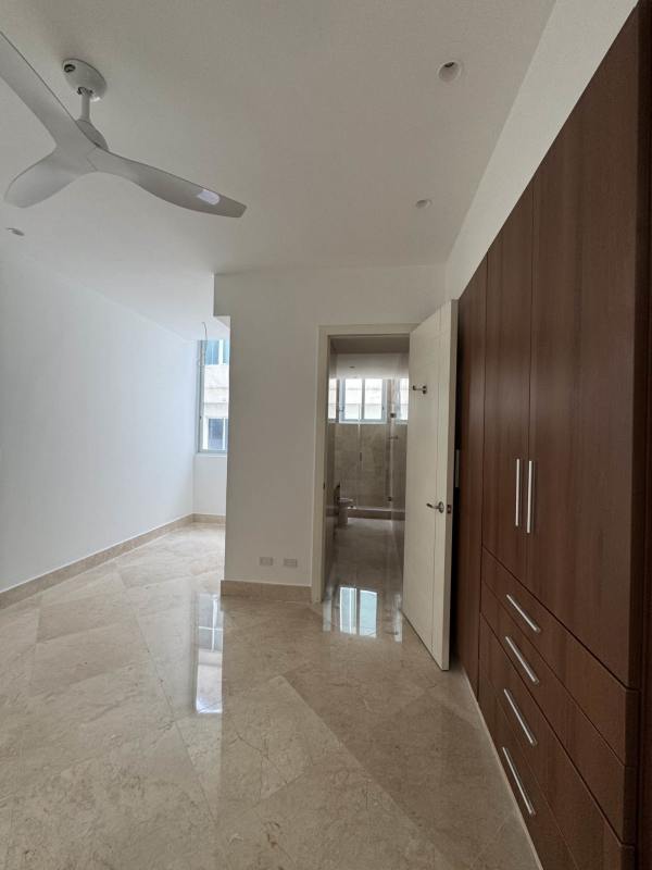 Large master suite with floor-to-ceiling glass and panoramic ocean view The Point Punta Paitilla