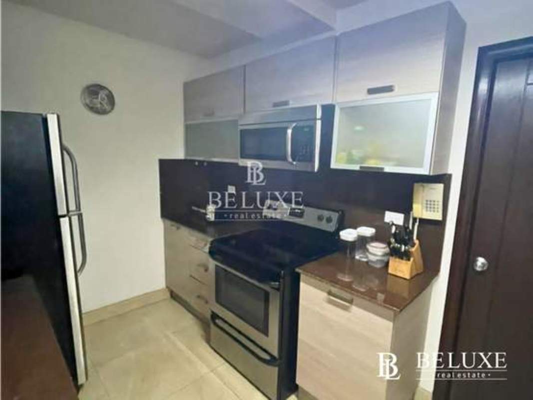 Infinity pool overlooking Pacific Ocean and Cinta Costera at PH Villa del Mar in Panama City