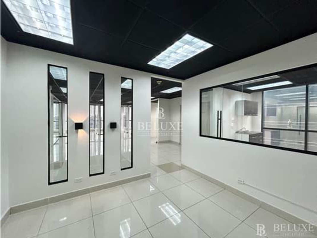 Glass-partitioned meeting room with panoramic views in PH Plaza Banco General banking district Panama City