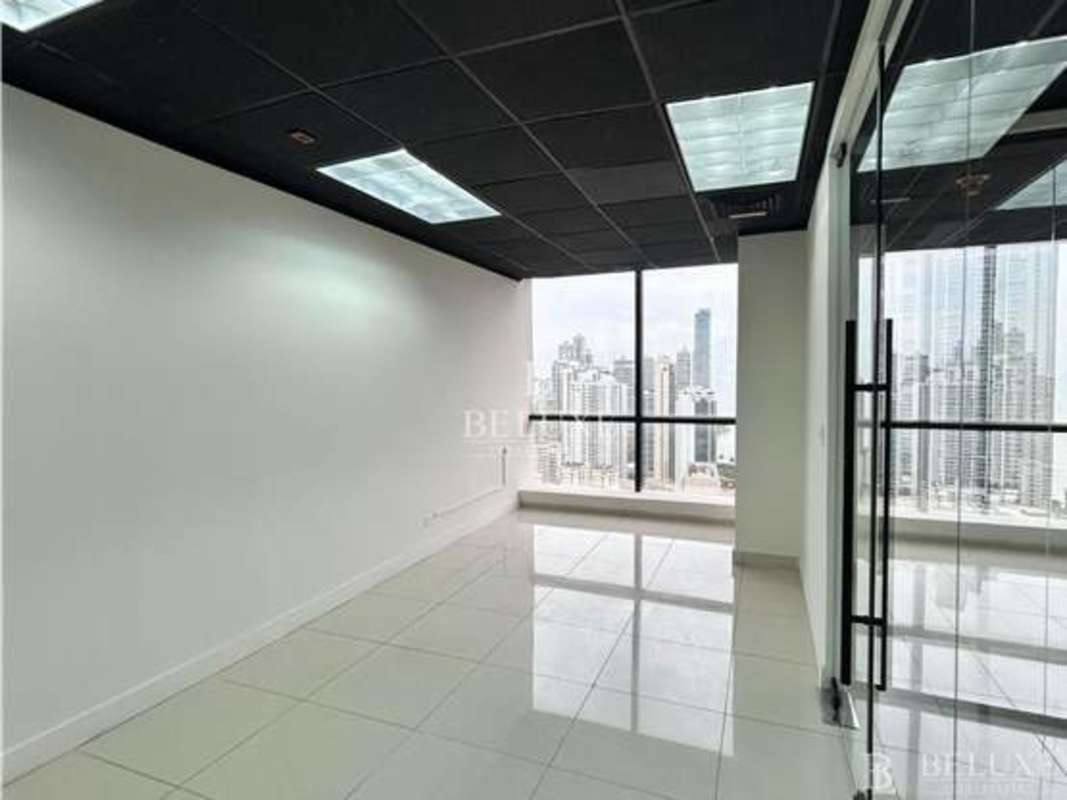 City skyline panorama from office floor to ceiling windows PH Plaza Banco General Calle 50