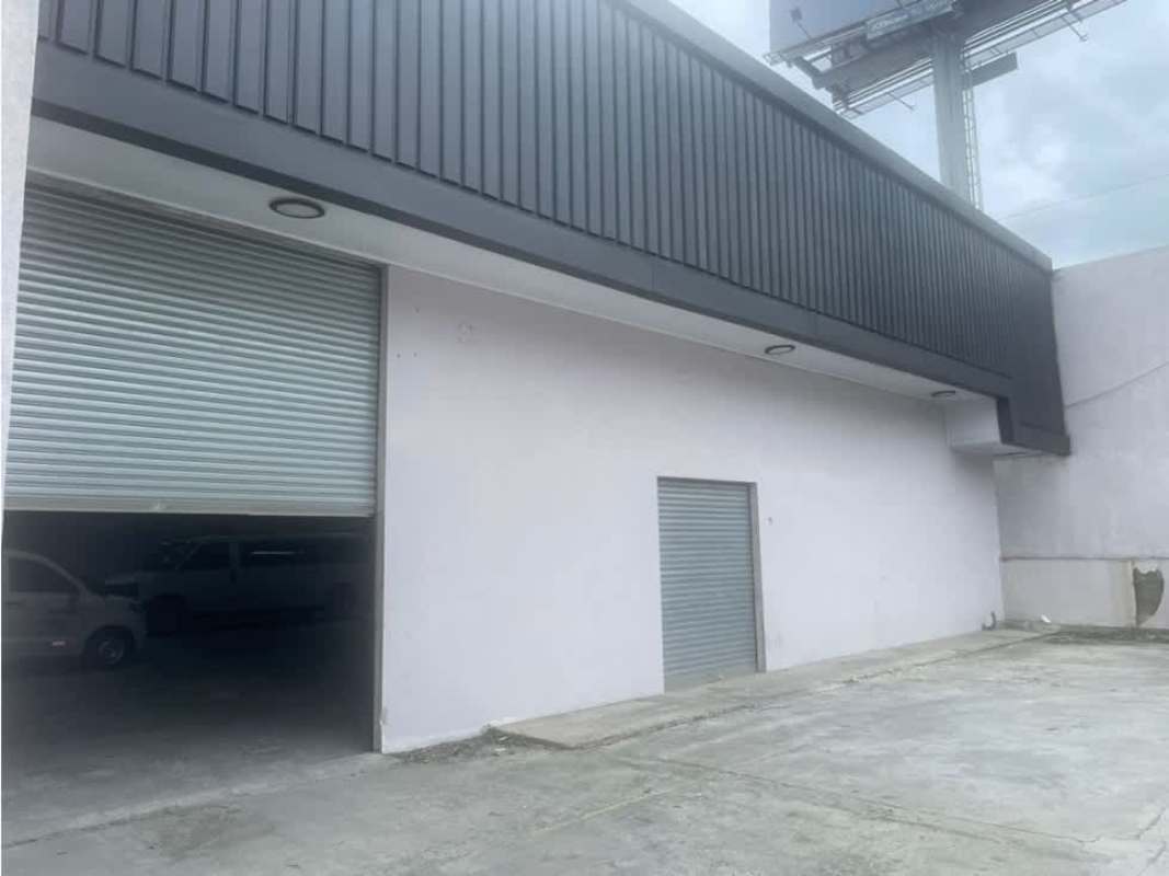 Front exterior with large rolling doors commercial industrial warehouse Panama Viejo Via Cincuentenario