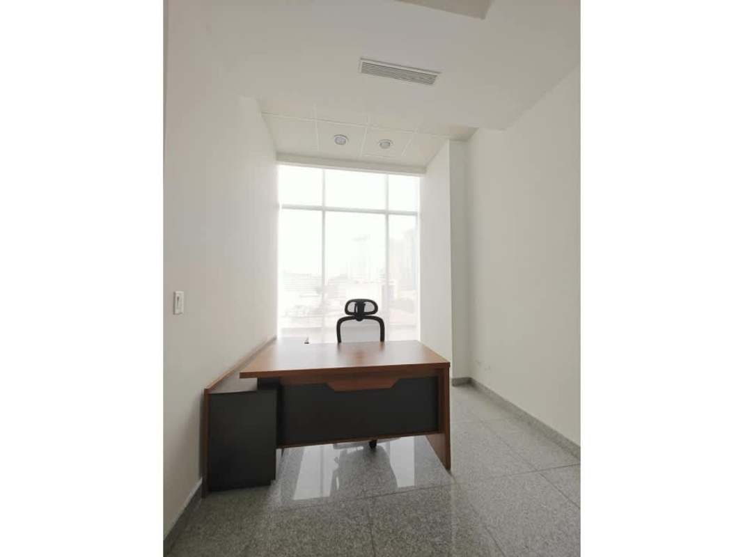 Spacious office with large window, natural light, wooden desk in PH Financial Park Tower Panama City