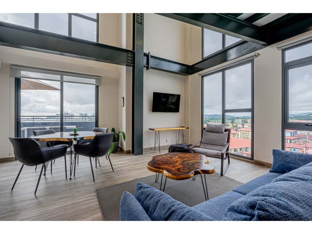 Bright modern kitchen with green tile backsplash PH Casco View Casco Viejo Panama