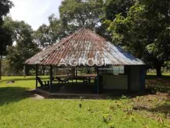 Rustic gazebo outdoor shelter with metal roof on ranch estate Nueva Gorgona Panama