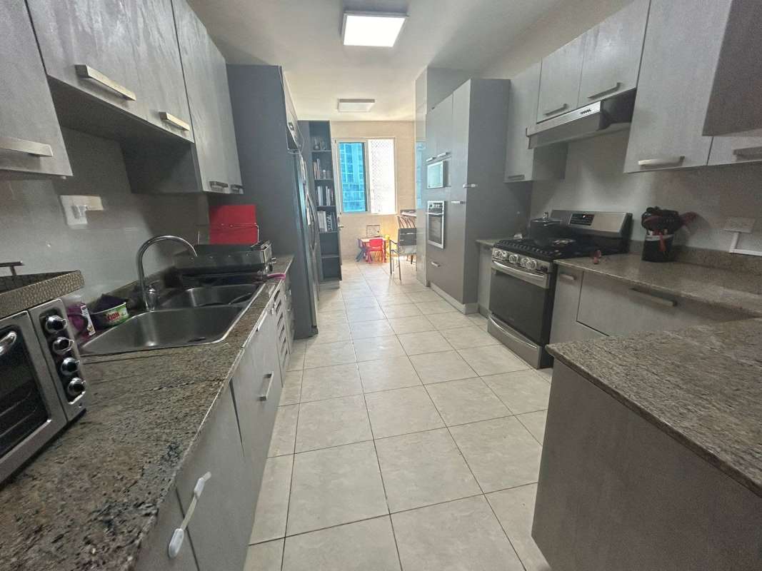 Stylish kitchen with granite countertops, appliances in Pacific Village Punta Pacífica Panama