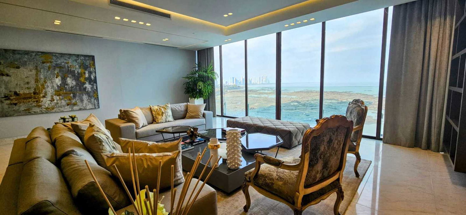 Elegant contemporary living room with views of ocean and city The Residences Punta Pacífica Panama