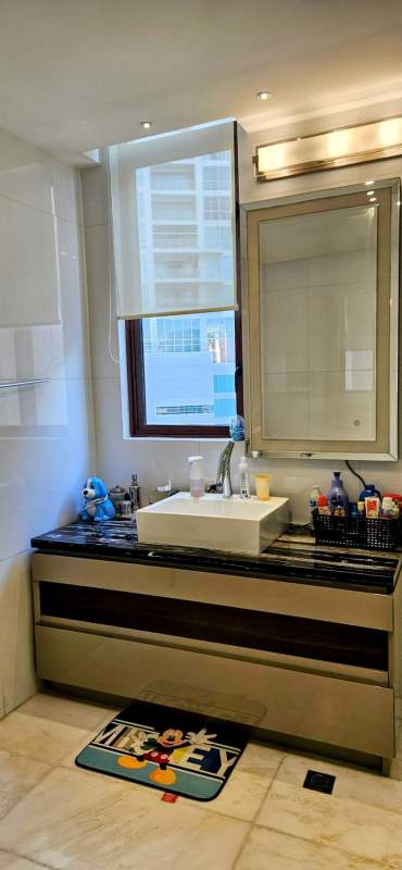 Luxury bathroom with marble counters and double sinks at The Residences Punta Pacífica Panama