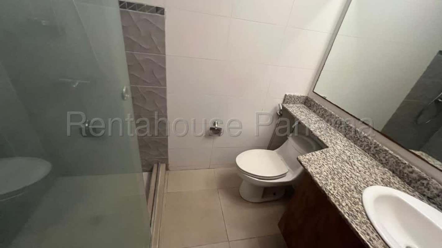 Modern kitchen with granite counter, stainless appliances, and tile floors in PH San Francisco Carrasquilla