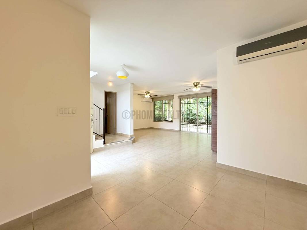 Kitchen with granite countertops, tiled floors, modern cabinets for rent house in Clayton Panama