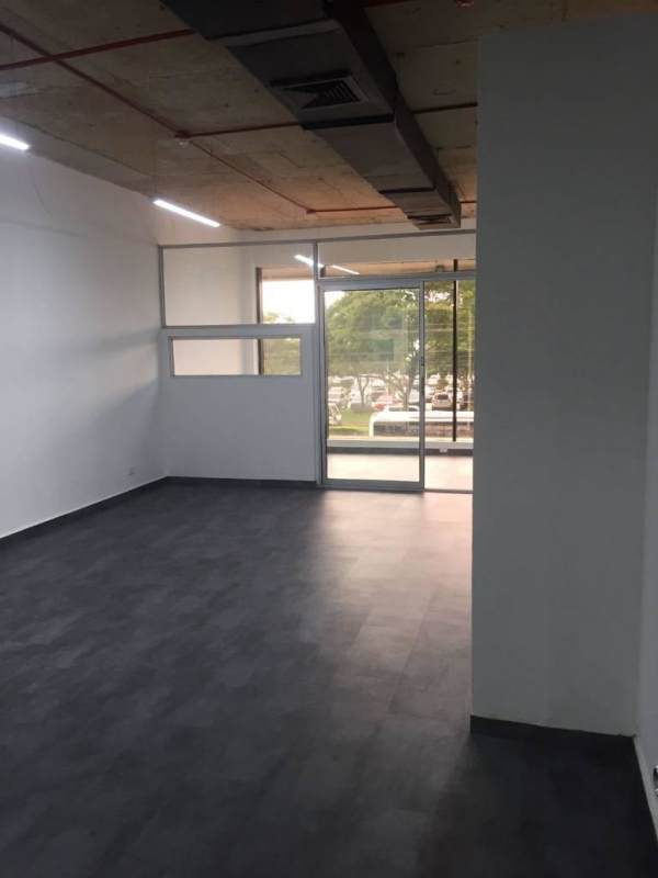 Interior with exposed ducts minimalist modern office PH BICSA Tower