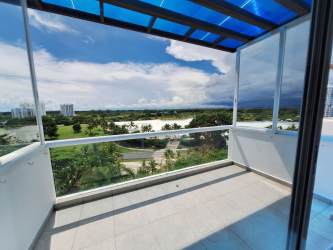 Swimming pools and tropical gardens at Playa Blanca Town Center Rio Hato Panama