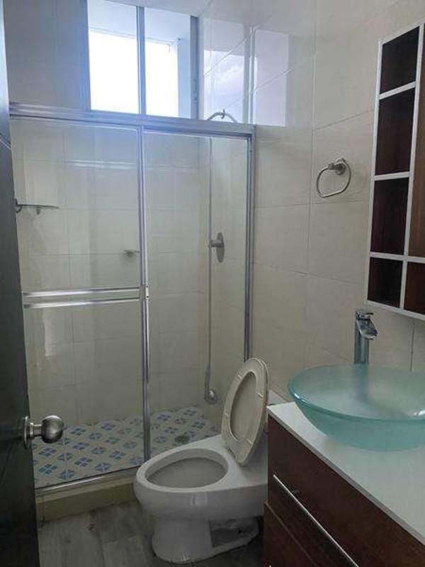 Bathroom with glass shower enclosure vanity PH Famagosta Loft Panama City