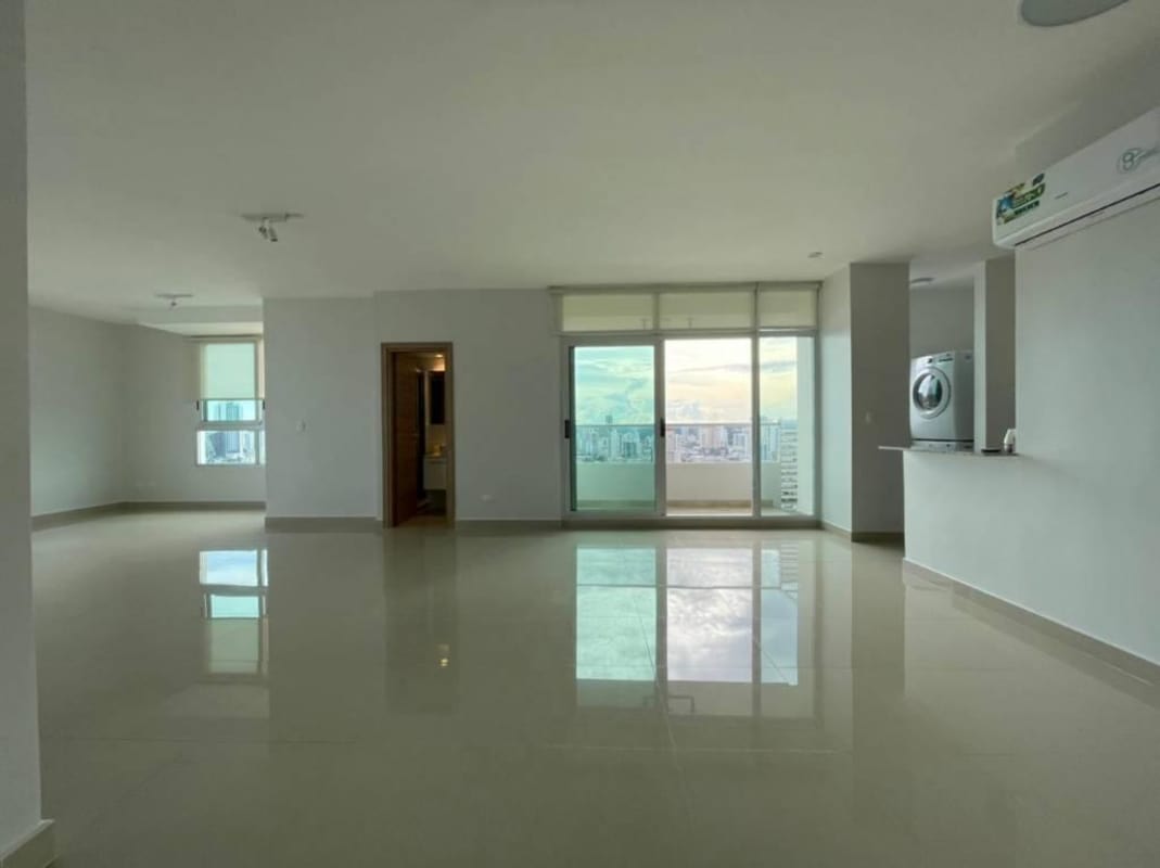 Kitchen with granite countertops, built-in oven, stove, and stainless refrigerator in PH Roma San Francisco Panama