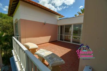 Spacious terrace with stone seating and garden view in Costa Blanca Villas Panama