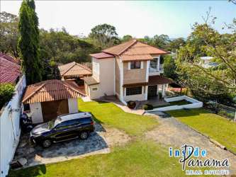 Spacious covered terrace with outdoor dining and pool views at Costa Esmeralda beachfront home
