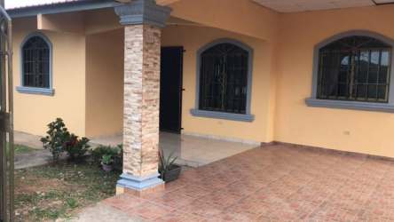 Functional kitchen with granite tile and large window Aguadulce Panama