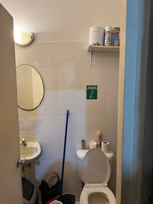 Fashion boutique entrance with glass exterior mannequin display in Albrook Mall Panama