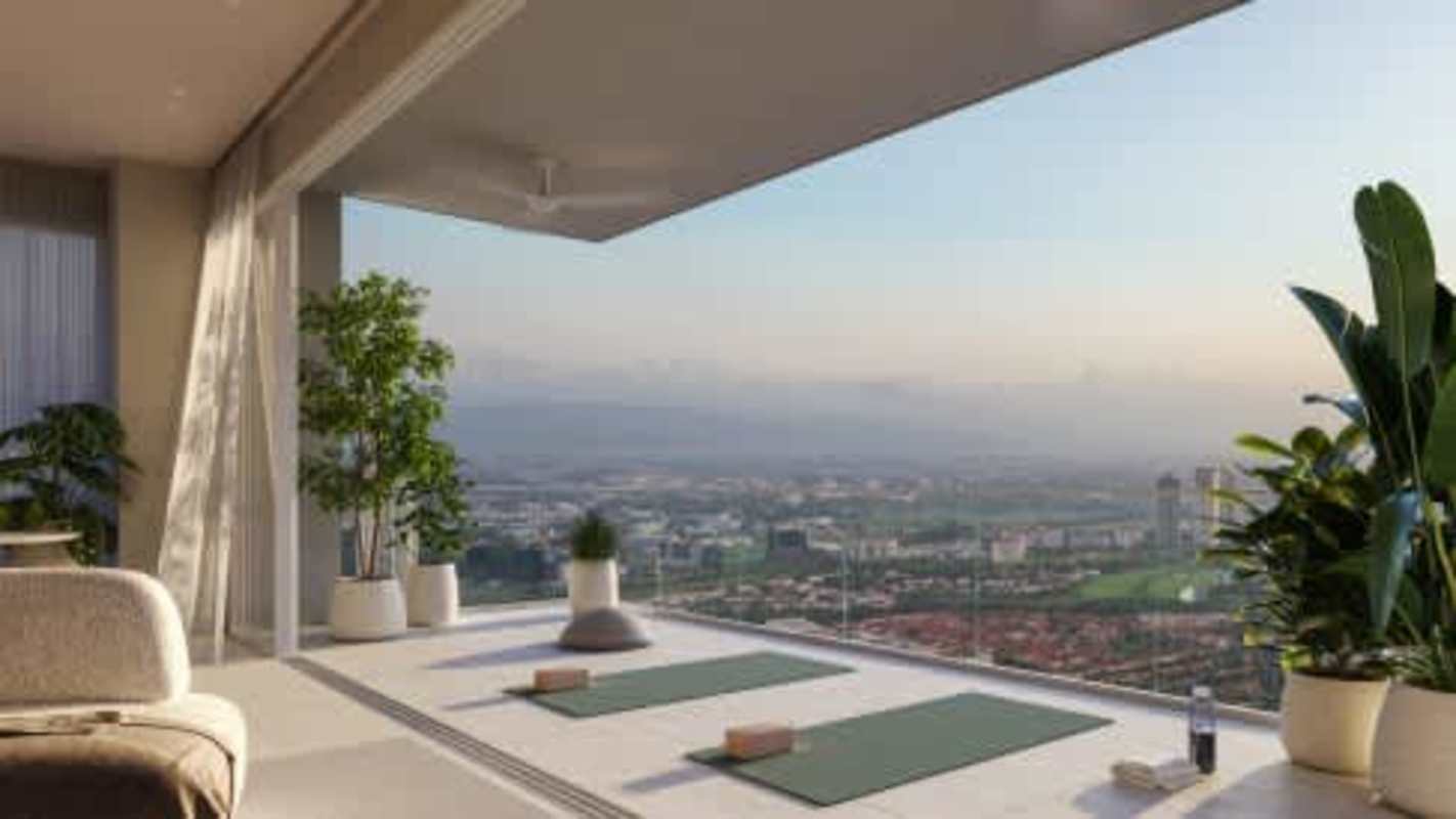 Yoga mats on sunrise balcony with panoramic skyline view BIOMA Tower Costa del Este Panama