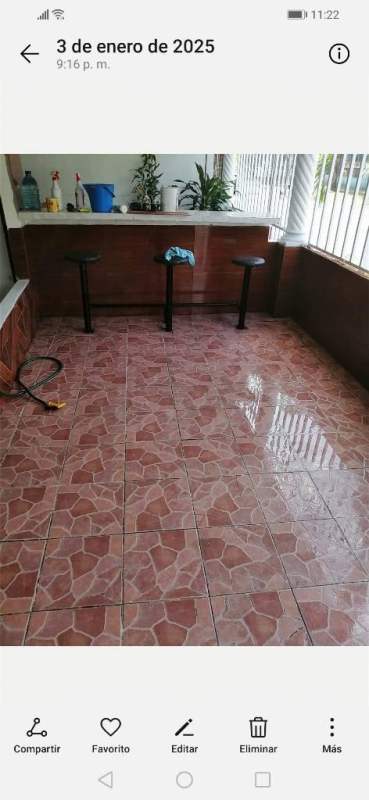 Covered patio or customer seating area with bar counter Villa de las Fuentes Panama