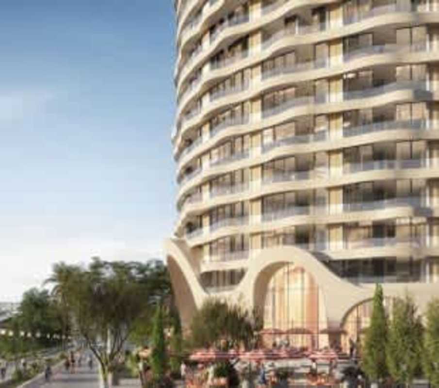 Modern design condos with curved balconies and outdoor cafe areas at Cavarosa in Panama City