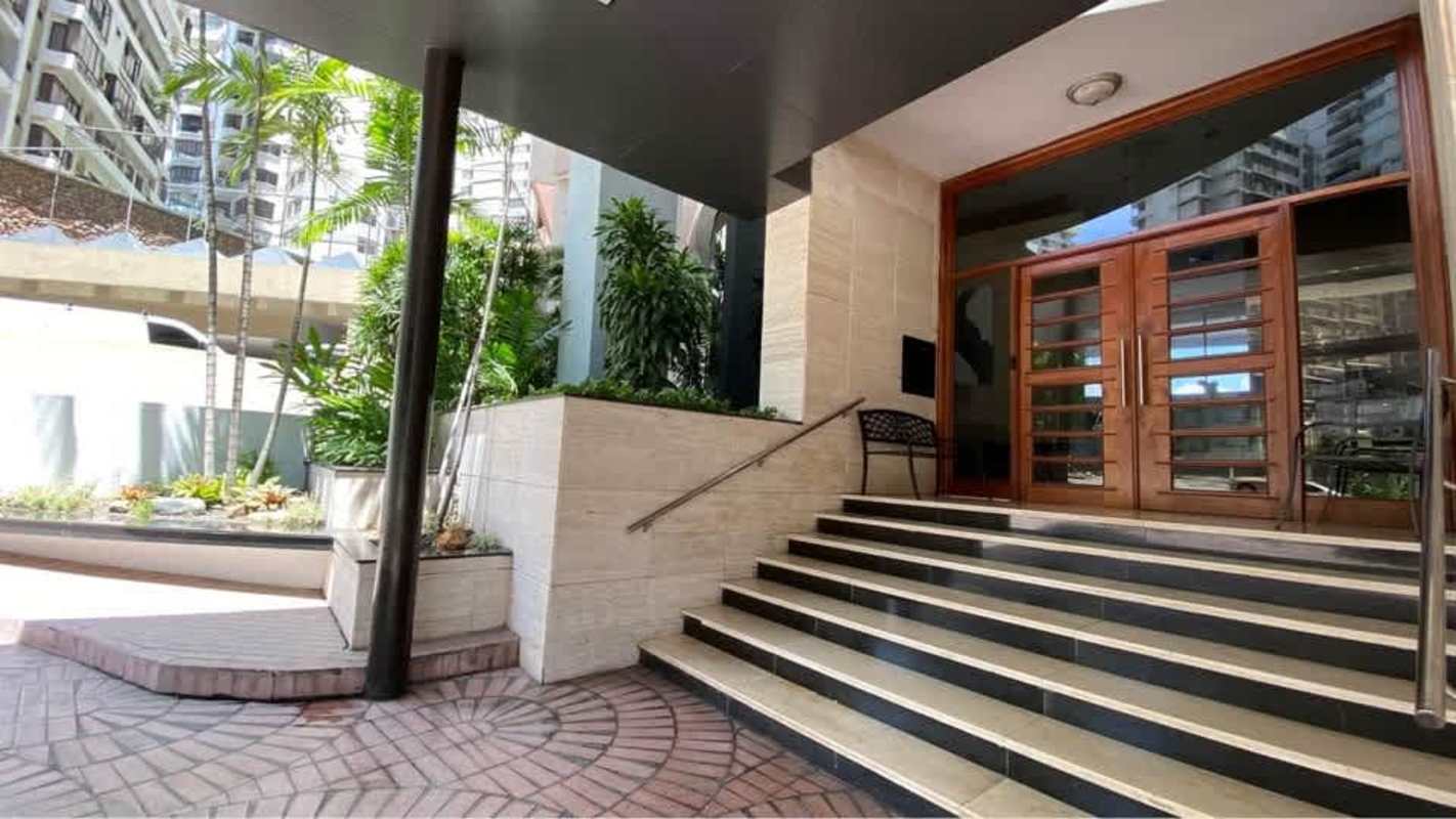 Elegant exterior entrance with double doors and planters PH Mar de Plata Panama