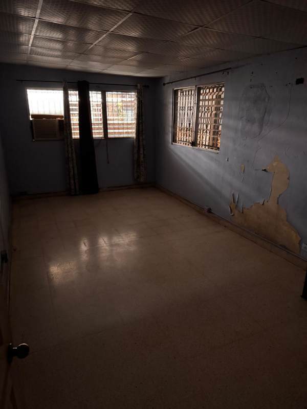 Spacious family living and dining area with tiled floor in San Antonio house Panama