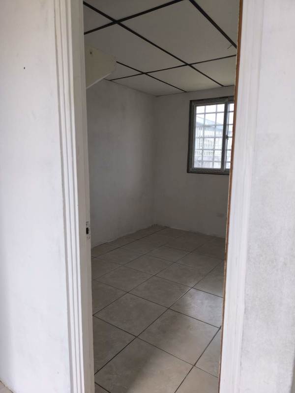 Laundry utility area with pink utility sink Nuevo Tocumen Panama rental house