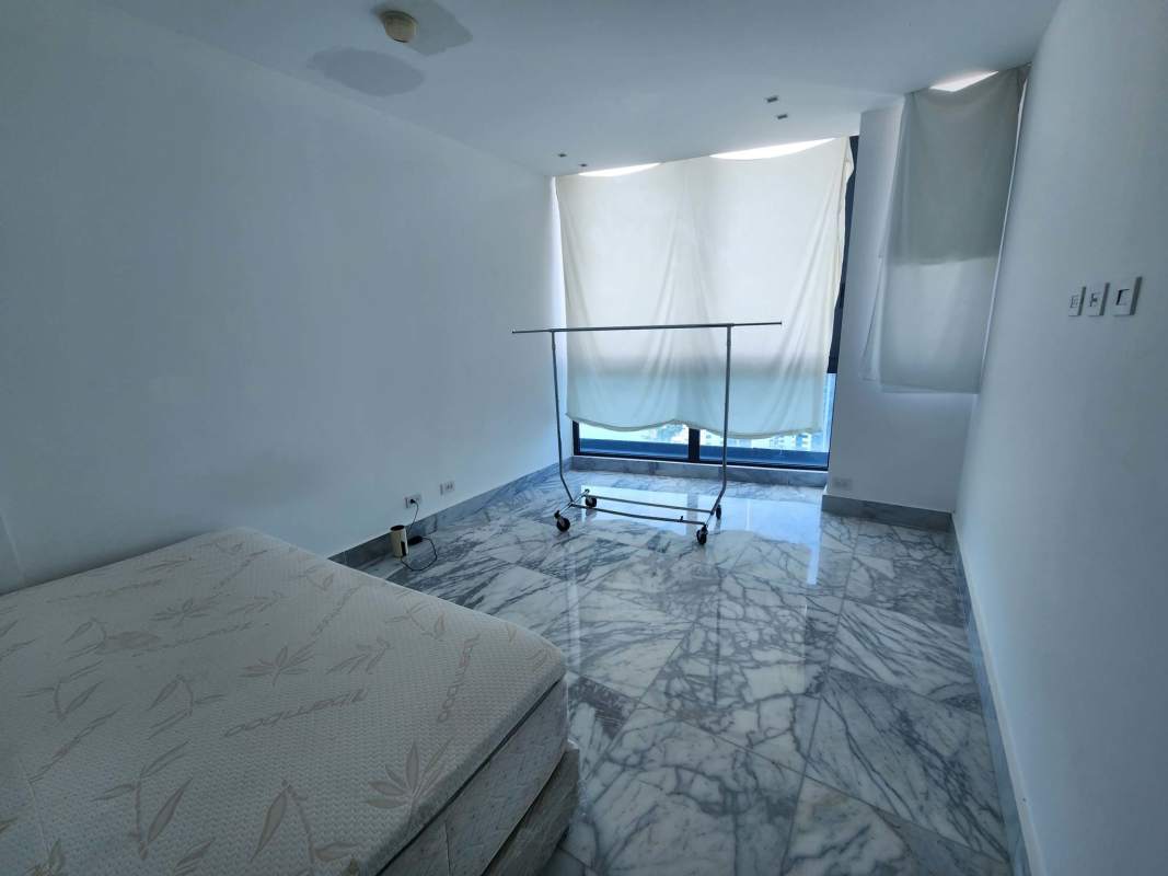 Luxury bedroom with large window city skyline and sea views PH Ocean Front Punta Paitilla Panama City