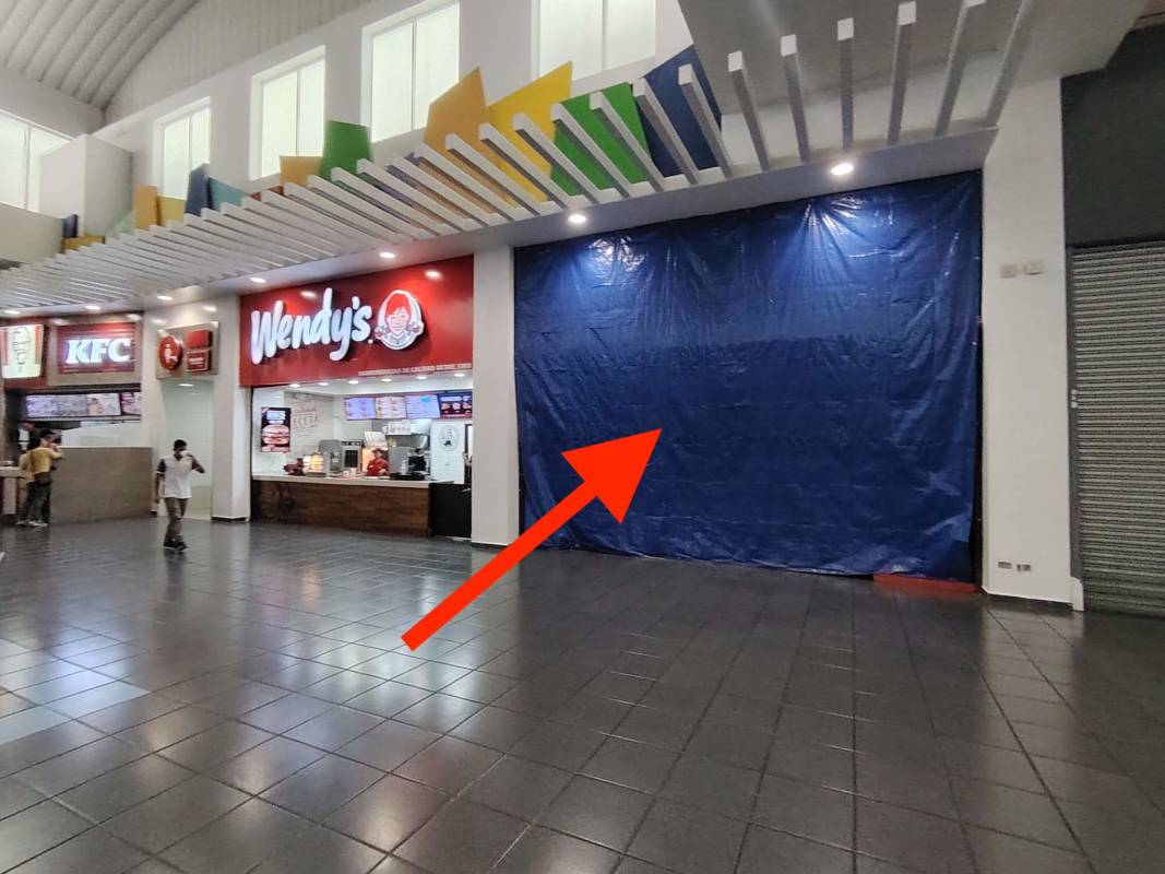 Food court with active fast food restaurants inside Albrook Mall Panama City