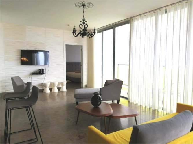 Contemporary kitchen with granite countertops open plan PH Vista Marina Panama City