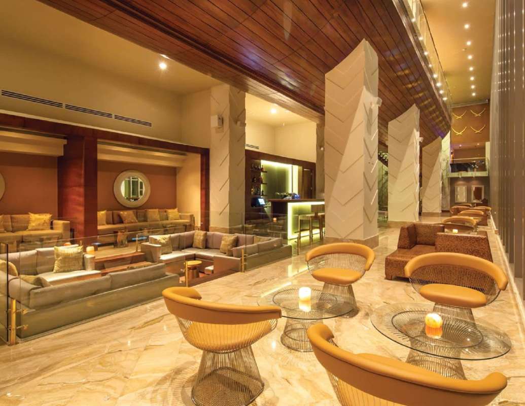 Stylish open kitchen and dining space in Waldorf Astoria apartment Marbella Panama