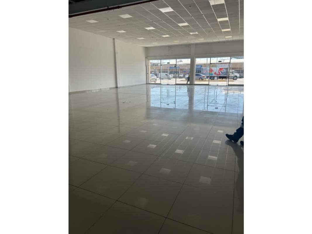 Spacious warehouse room with exposed beams and concrete floor inside La Doña commercial unit Panama