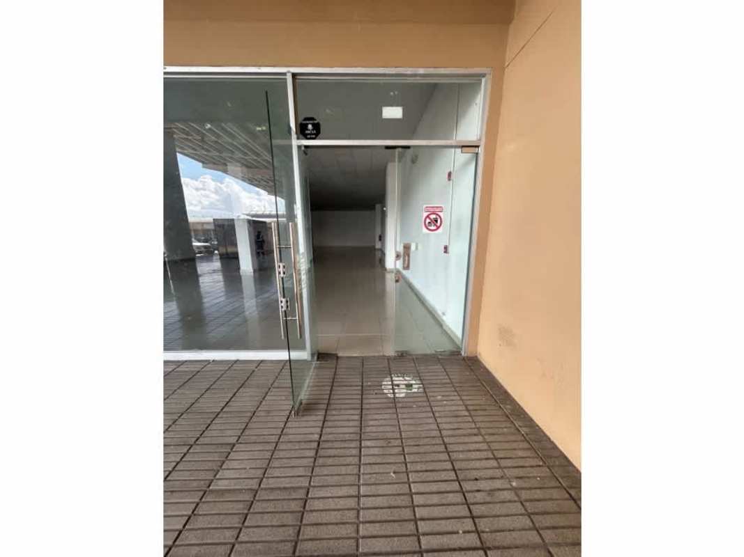 Main entrance with glass panels to commercial space at Centro Comercial La Doña Panama City