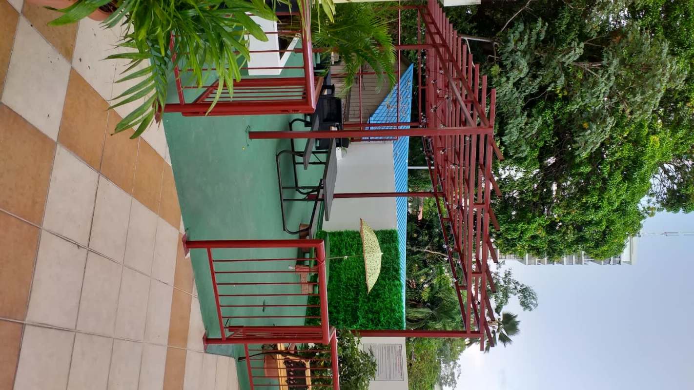 Exterior view of PH Bella Vista Gardens with balconies, secured fence Panama City