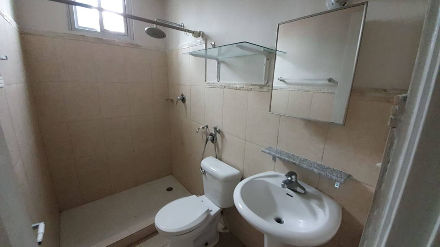 Bathroom with glass shelf, walk-in shower, modern simple design PH Bella Vista Gardens Panama City