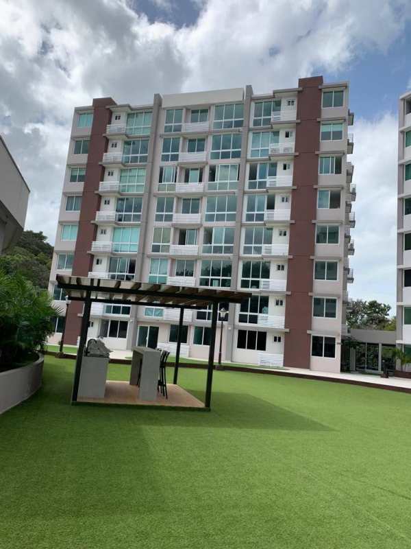 Modern kitchen with large window, stainless fridge, minimalist cabinets PH Forest Gate Albrook