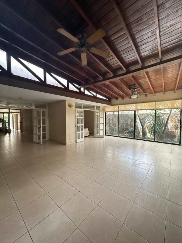 Modern house facade with garden trees garage in exclusive Altos de Golf Panama City