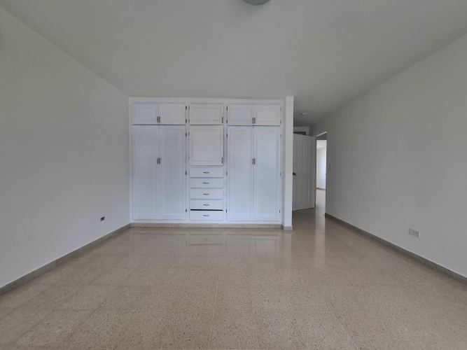 Spacious luxury kitchen with granite countertops, island and city views PH Villa Marina Punta Paitilla Panama