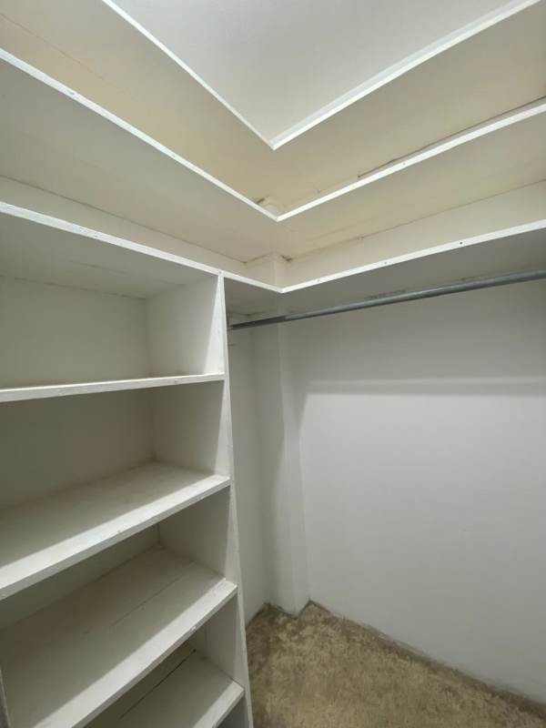 Walk-in shower with mosaic tile floor and louvered window PH Don Goyo Calidonia