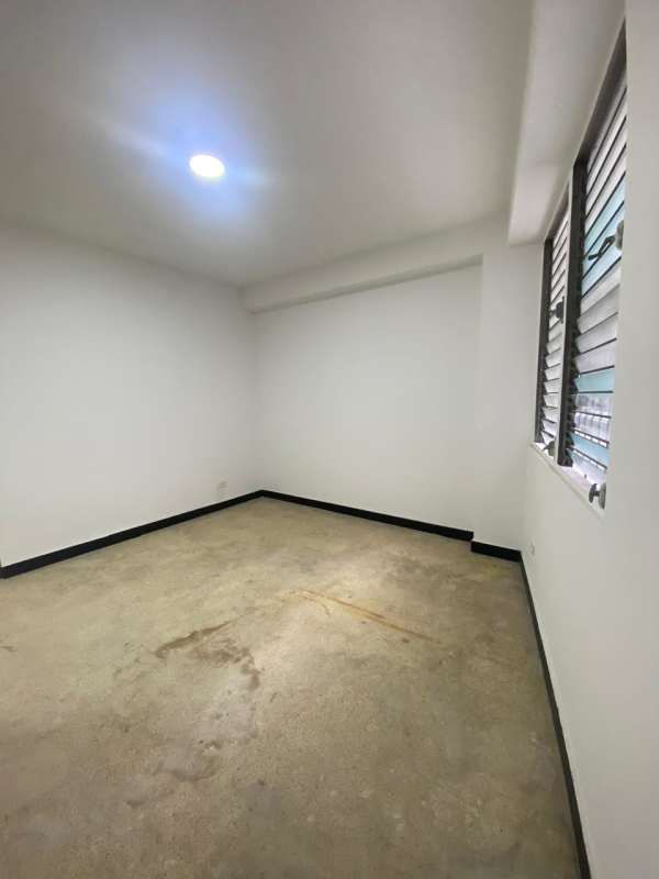 Open living and dining room with natural light and connection to balcony PH Don Goyo