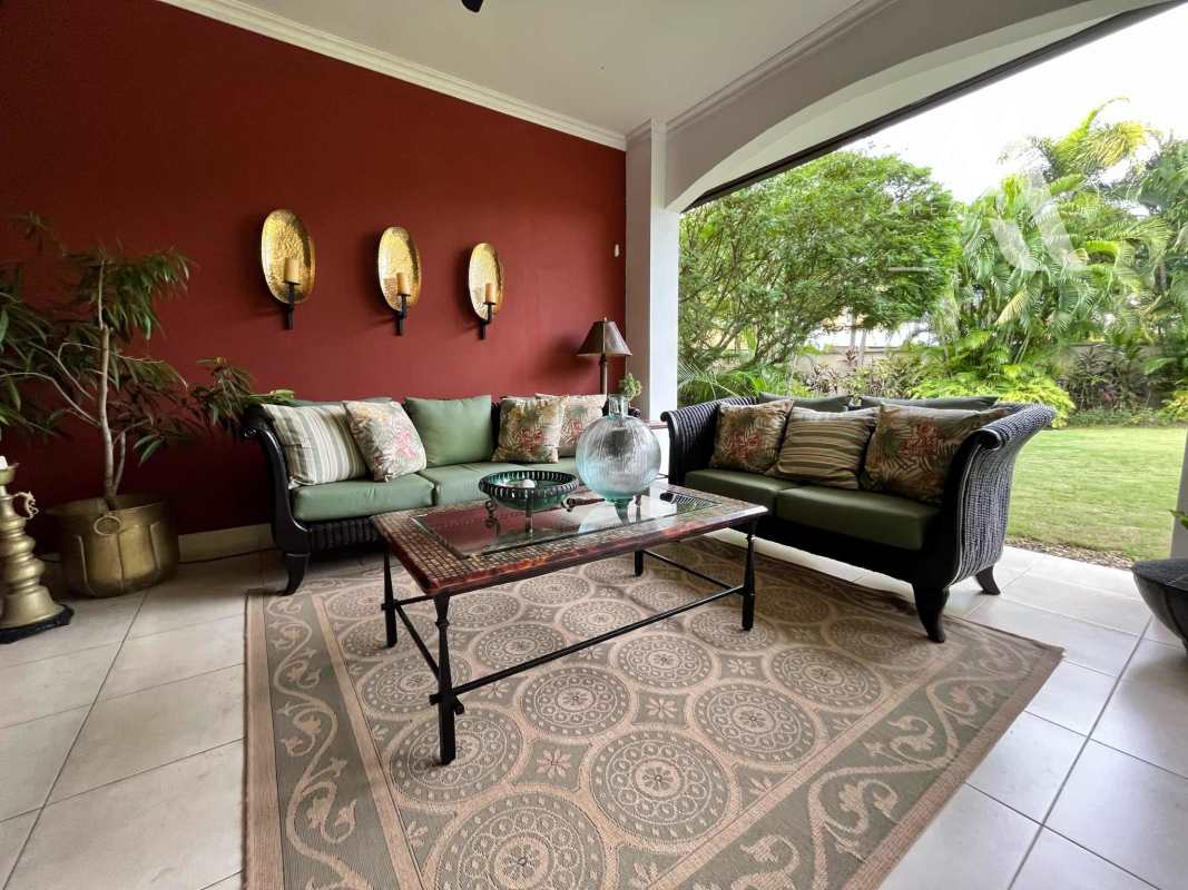 Spacious covered patio with outdoor bar, dining and seating area Costa del Este Panama luxury rental