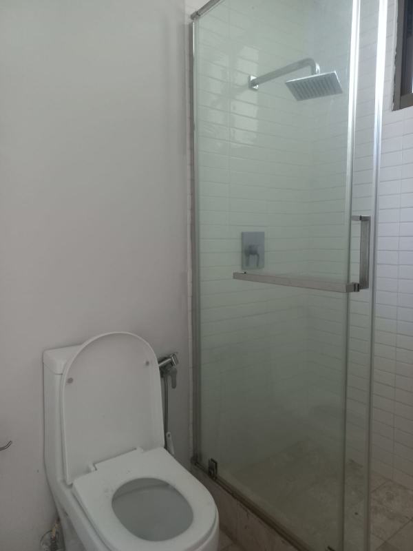 Kitchen with granite countertops and wood cabinetry in PH Ocean Park Punta Pacifica Panama