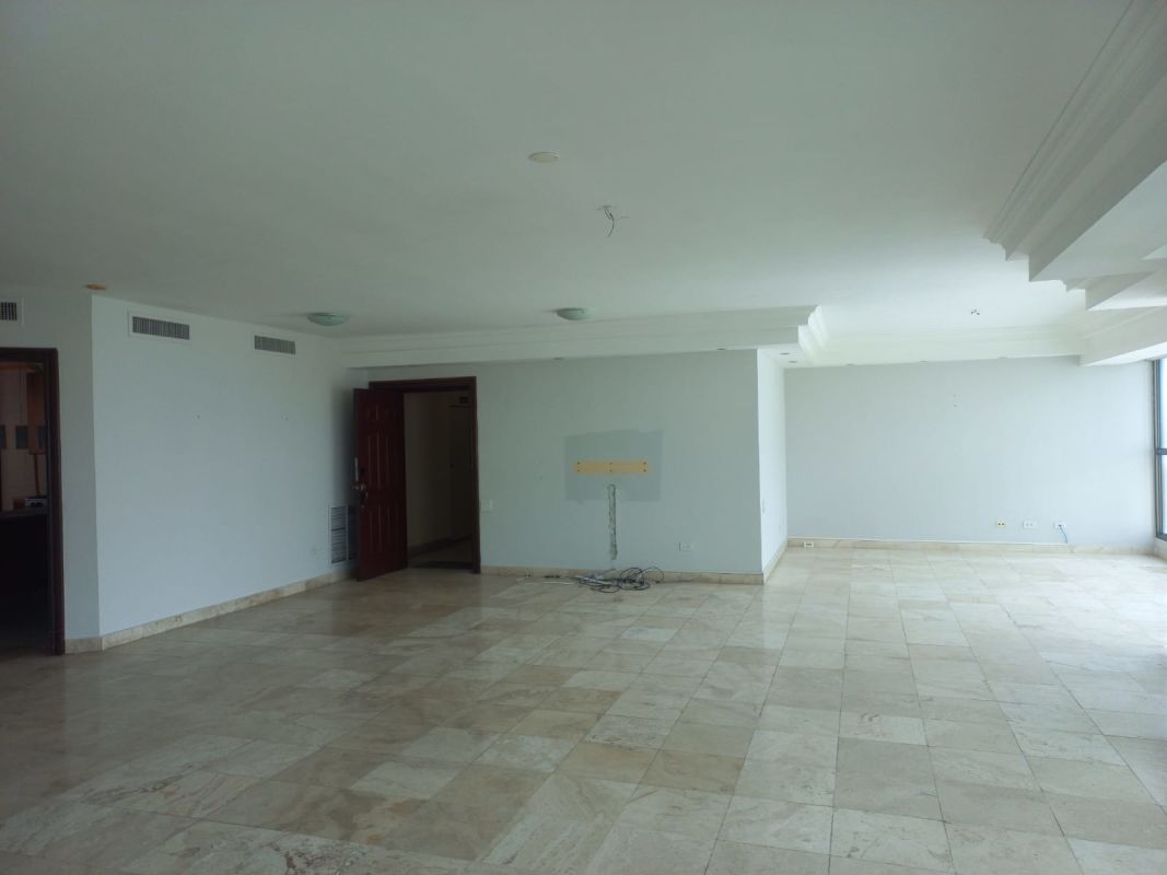 Bedroom with large windows and city views at PH Ocean Park Punta Pacifica Panama