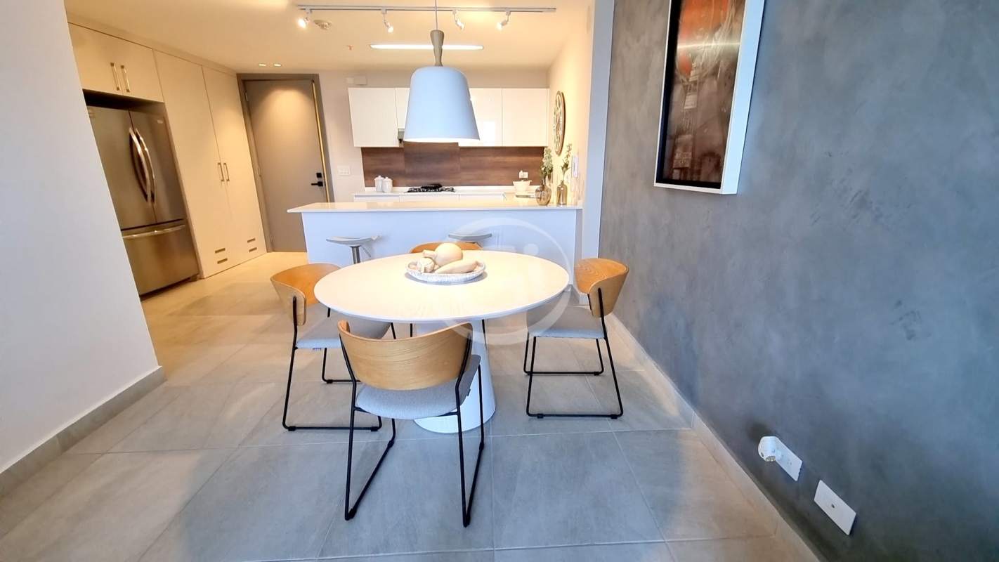 Dining space open kitchen Van Gogh Residences Panama City modern apartment