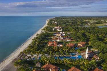 Aerial shot luxury villas, golf course, beach and marina at Buenaventura Panama